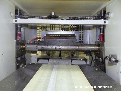 Used Doboy Mustang IV Horizontal Wrapper. Machine is capable of speeds up to 90 cpm. The Doboy is a 1 up unit with film registration and an Argus bar code scanner. Package size range: length up to 15...