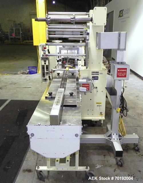 Used Doboy Mustang IV Horizontal Wrapper. Machine is capable of speeds up to 150 cpm. 1 up unit with film registration andArgus bar code scanner. Package size range: length up to 15", height up to 2-...