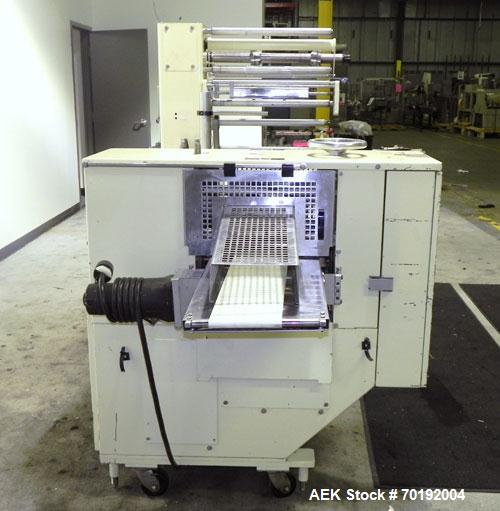 Used Doboy Mustang IV Horizontal Wrapper. Machine is capable of speeds up to 150 cpm. 1 up unit with film registration andArgus bar code scanner. Package size range: length up to 15", height up to 2-...