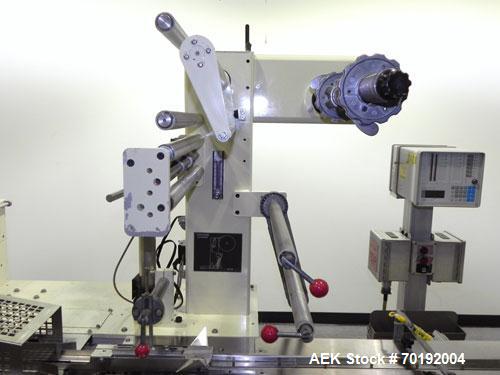 Used Doboy Mustang IV Horizontal Wrapper. Machine is capable of speeds up to 150 cpm. 1 up unit with film registration andArgus bar code scanner. Package size range: length up to 15", height up to 2-...
