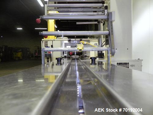 Used Doboy Mustang IV Horizontal Wrapper. Machine is capable of speeds up to 150 cpm. 1 up unit with film registration andArgus bar code scanner. Package size range: length up to 15", height up to 2-...