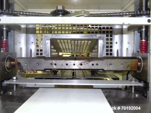Used Doboy Mustang IV Horizontal Wrapper. Machine is capable of speeds up to 150 cpm. 1 up unit with film registration andArgus bar code scanner. Package size range: length up to 15", height up to 2-...