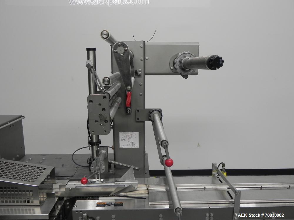 Used Doboy Mustang IV Horizontal Wrapper. Machine is capable of speeds up to 150 cpm. 2 up unit with film registration. Package size range: length up to 15", height up to 2-1/4", width up to 6-1/2". ...