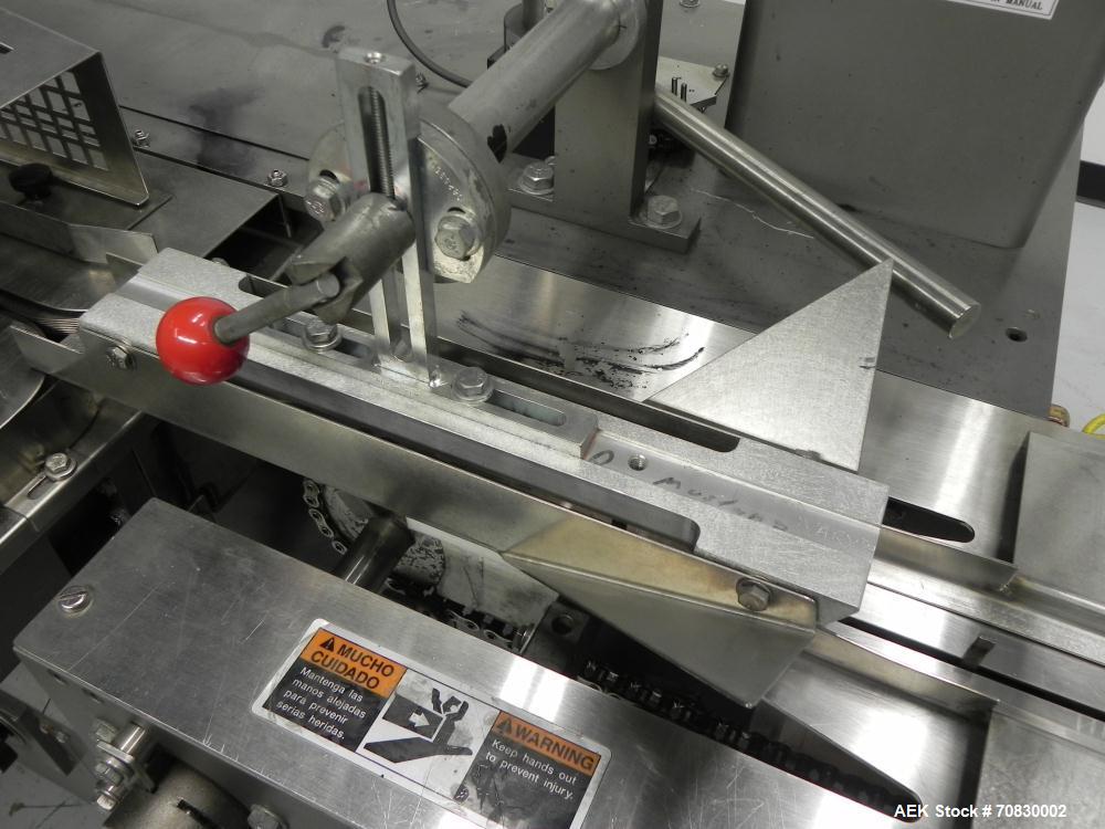 Used Doboy Mustang IV Horizontal Wrapper. Machine is capable of speeds up to 150 cpm. 2 up unit with film registration. Package size range: length up to 15", height up to 2-1/4", width up to 6-1/2". ...
