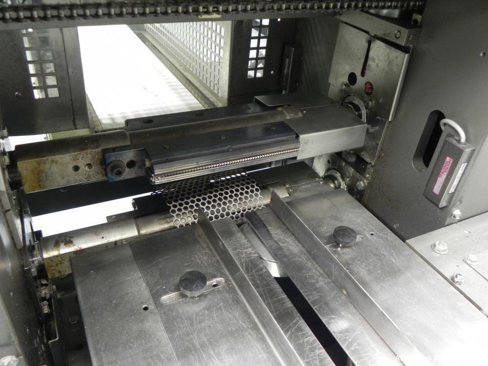 Used Doboy Mustang IV Horizontal Wrapper. Machine is capable of speeds up to 150 cpm. 2 up unit with film registration. Package size range: length up to 15", height up to 2-1/4", width up to 6-1/2". ...