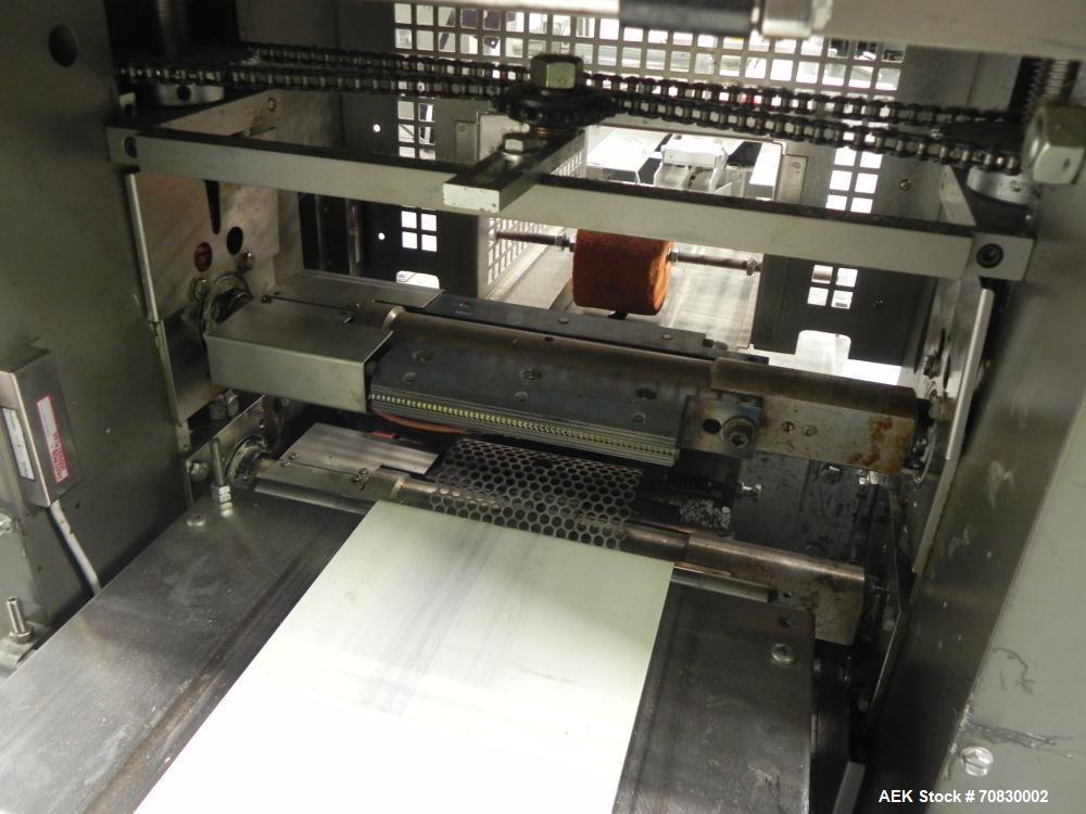 Used Doboy Mustang IV Horizontal Wrapper. Machine is capable of speeds up to 150 cpm. 2 up unit with film registration. Package size range: length up to 15", height up to 2-1/4", width up to 6-1/2". ...