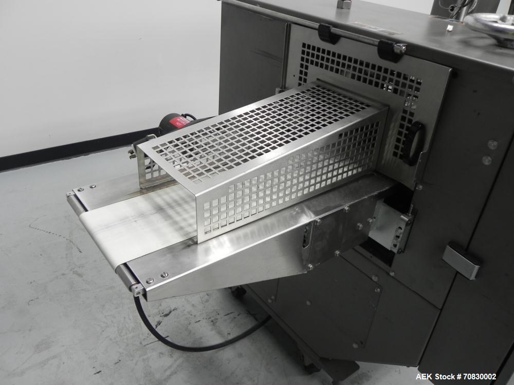 Used Doboy Mustang IV Horizontal Wrapper. Machine is capable of speeds up to 150 cpm. 2 up unit with film registration. Package size range: length up to 15", height up to 2-1/4", width up to 6-1/2". ...