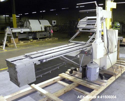 Used Doboy Mustang Horizontal Wrapper. Capable of speeds up to 90 packages per minute. Has a package size range of 1/2" to 7" width x 3" to 15" length, and a maximum height up to 2-3/4". Has an 8" wi...
