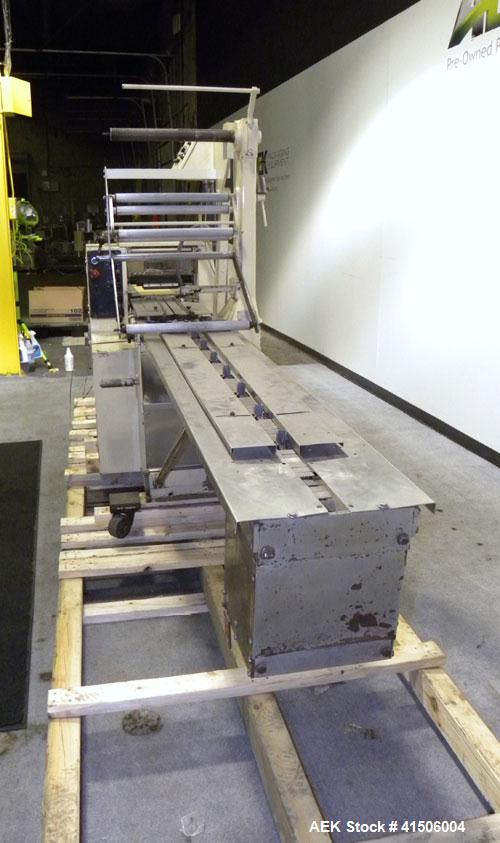 Used Doboy Mustang Horizontal Wrapper. Capable of speeds up to 90 packages per minute. Has a package size range of 1/2" to 7" width x 3" to 15" length, and a maximum height up to 2-3/4". Has an 8" wi...