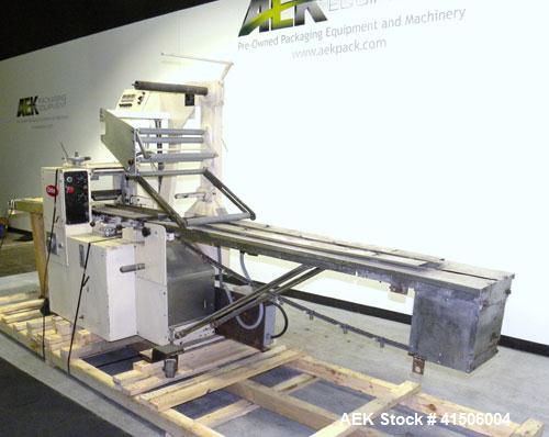 Used Doboy Mustang Horizontal Wrapper. Capable of speeds up to 90 packages per minute. Has a package size range of 1/2" to 7" width x 3" to 15" length, and a maximum height up to 2-3/4". Has an 8" wi...