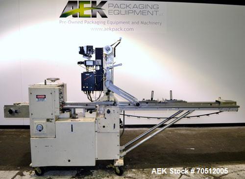 Used Doboy Mustang Horizontal Wrapper. Machine is capable of speeds up to 96 packages per minute. Has a one up head, print registration and Markem 984 hot stamp date coder. Machine has SmartEye senso...