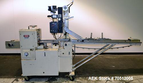 Used Doboy Mustang Horizontal Wrapper. Machine is capable of speeds up to 96 packages per minute. Has a one up head, print registration and Markem 984 hot stamp date coder. Machine has SmartEye senso...