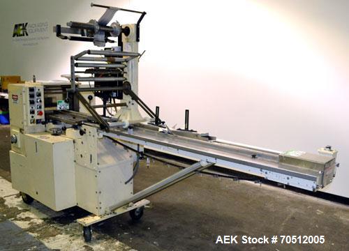 Used Doboy Mustang Horizontal Wrapper. Machine is capable of speeds up to 96 packages per minute. Has a one up head, print registration and Markem 984 hot stamp date coder. Machine has SmartEye senso...