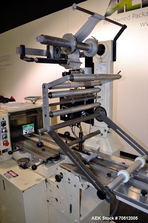 Used Doboy Mustang Horizontal Wrapper. Machine is capable of speeds up to 96 packages per minute. Has a one up head, print registration and Markem 984 hot stamp date coder. Machine has SmartEye senso...