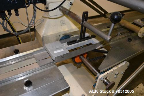 Used Doboy Mustang Horizontal Wrapper. Machine is capable of speeds up to 96 packages per minute. Has a one up head, print registration and Markem 984 hot stamp date coder. Machine has SmartEye senso...