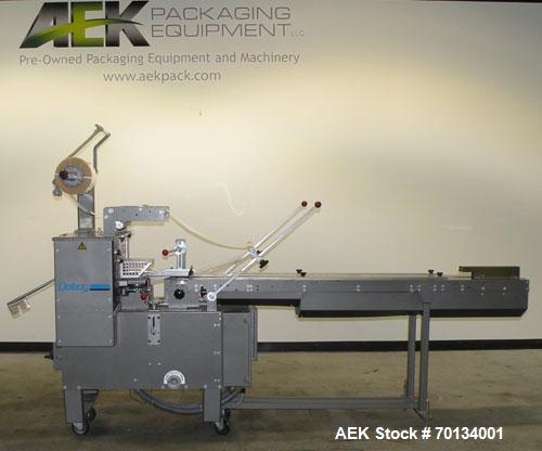 Used Doboy Scotty II Horizontal Flow Wrapper. Capable of speeds up to 75 packages per minute. Has 5' Long lugged chain infeed. Package size range: length 4" to 15", width 1" to 5-1/2", height up to 2...