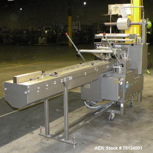 Used Doboy Scotty II Horizontal Flow Wrapper. Capable of speeds up to 75 packages per minute. Has 5' Long lugged chain infeed. Package size range: length 4" to 15", width 1" to 5-1/2", height up to 2...