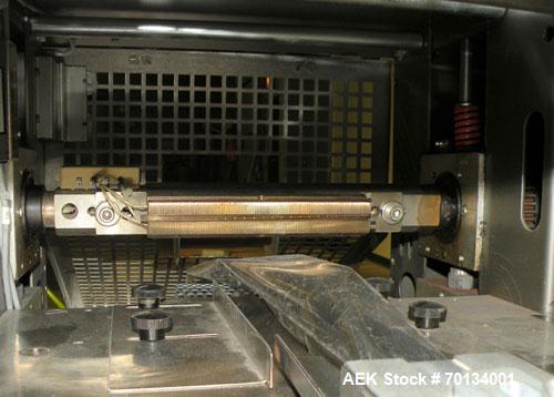 Used Doboy Scotty II Horizontal Flow Wrapper. Capable of speeds up to 75 packages per minute. Has 5' Long lugged chain infeed. Package size range: length 4" to 15", width 1" to 5-1/2", height up to 2...