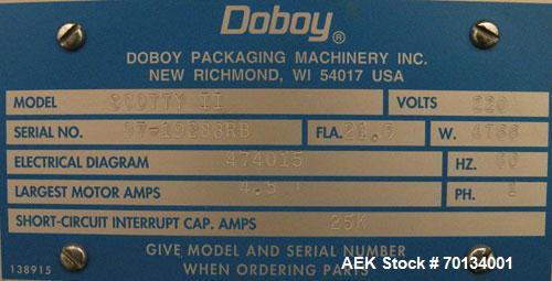 Used Doboy Scotty II Horizontal Flow Wrapper. Capable of speeds up to 75 packages per minute. Has 5' Long lugged chain infeed. Package size range: length 4" to 15", width 1" to 5-1/2", height up to 2...