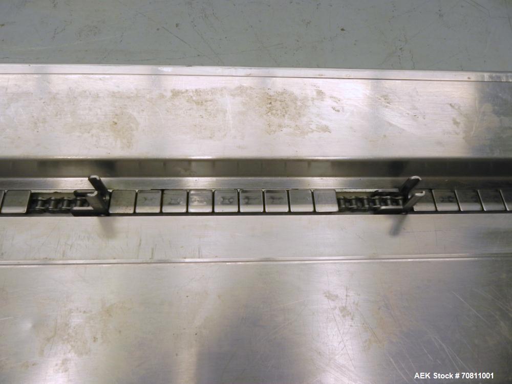Used Doboy Model Scotty II Horizontal Flow Wrapper. Machine is capable of speeds up to 60 packages per minute. Has 6' Long lugged Carrier Style chain infeed on 12” centers. Package size range: (lengt...
