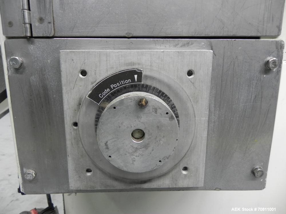 Used Doboy Model Scotty II Horizontal Flow Wrapper. Machine is capable of speeds up to 60 packages per minute. Has 6' Long lugged Carrier Style chain infeed on 12” centers. Package size range: (lengt...