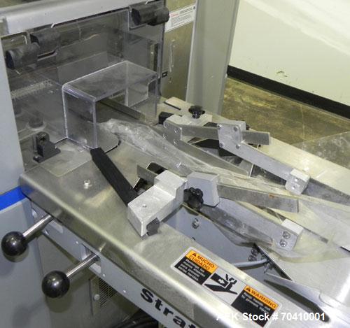 Used Bosch Doboy Model Stratus Horizontal Wrapper. Machine is capable of speeds from 20 to 150 packages per minute. Single up crimper 7" wide . Has a package size range: (Length) 4" to 14-3/4" or 100...