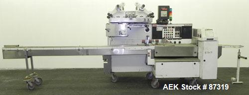 Used FMC Model WM20 SynchroFlo Horizontal Wrapper. Speeds up uo 300 packages per minute. 2 up cutting head, 1 1/2" wide x 7" long. Approximate 142" long lug chain infeed with carrier chain currently ...