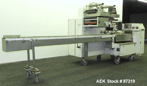 Used FMC Model WM20 SynchroFlo Horizontal Wrapper. Speeds up uo 300 packages per minute. 2 up cutting head, 1 1/2" wide x 7" long. Approximate 142" long lug chain infeed with carrier chain currently ...