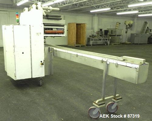 Used FMC Model WM20 SynchroFlo Horizontal Wrapper. Speeds up uo 300 packages per minute. 2 up cutting head, 1 1/2" wide x 7" long. Approximate 142" long lug chain infeed with carrier chain currently ...