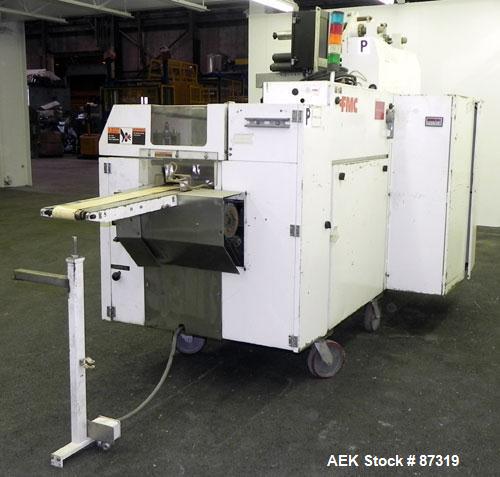 Used FMC Model WM20 SynchroFlo Horizontal Wrapper. Speeds up uo 300 packages per minute. 2 up cutting head, 1 1/2" wide x 7" long. Approximate 142" long lug chain infeed with carrier chain currently ...