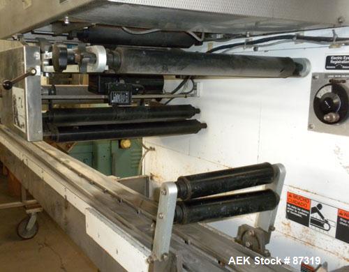 Used FMC Model WM20 SynchroFlo Horizontal Wrapper. Speeds up uo 300 packages per minute. 2 up cutting head, 1 1/2" wide x 7" long. Approximate 142" long lug chain infeed with carrier chain currently ...