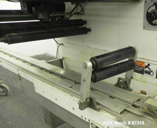 Used FMC Model WM20 SynchroFlo Horizontal Wrapper. Speeds up uo 300 packages per minute. 2 up cutting head, 1 1/2" wide x 7" long. Approximate 142" long lug chain infeed with carrier chain currently ...
