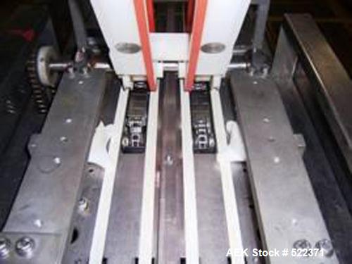 USED: FMC model WS-20 Series II horizontal wrapper. Dual land servo driven. All stainless steel wash down unit. Last ran meat patties.