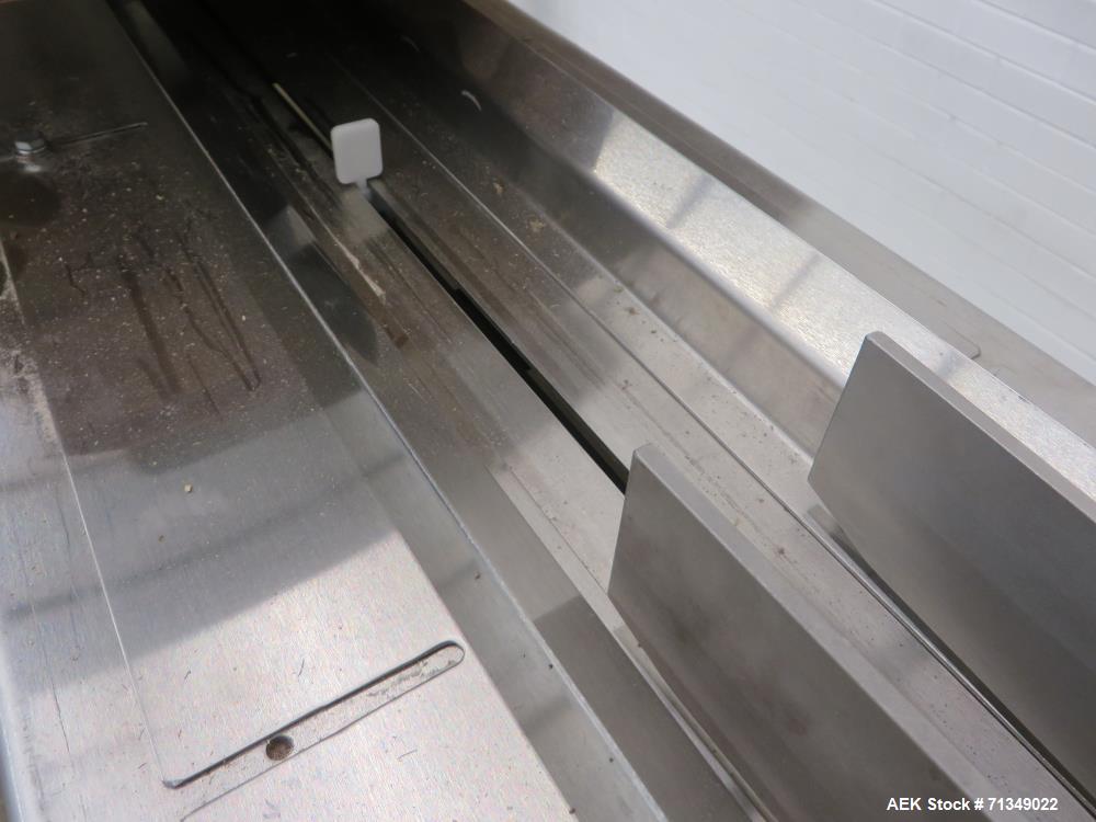 Used FMC Model WSD-20 Automatic stainless steel Servo Flo horizontal wrapper capable of speeds to 150 packages per minute  depending on materials and application. Package size: up to 18" in Length; u...