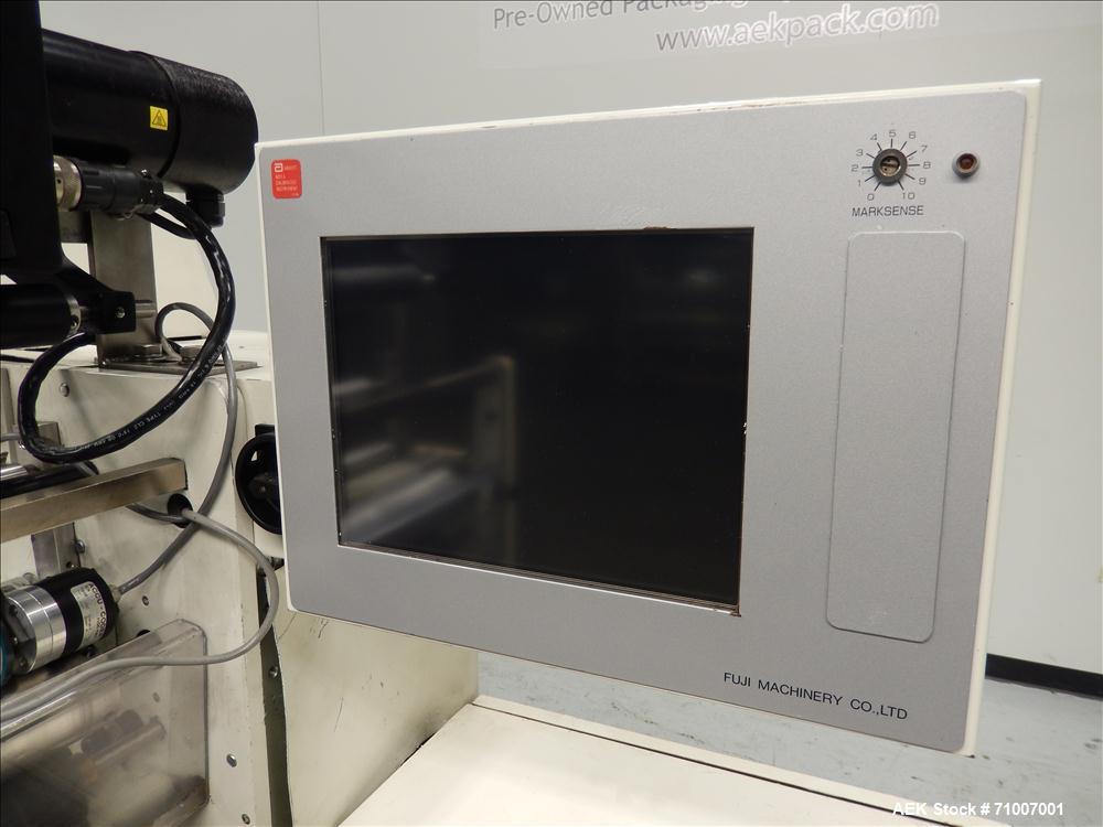 Used Fuji Formost Model FW-3400 Horizontal Form, Fill & Seal Wrapper.