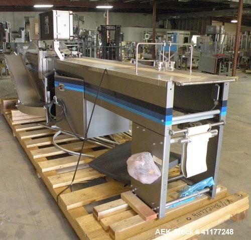 Used Hayssen Gas Fush Horizontal Wrapper, Model RT-1000 R. Capable of speeds up to 160 packages per minute. Inverted seal with Accutrac film feed system. Package size range: length 4.25" to 14", widt...