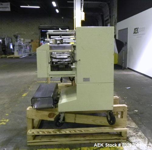 Used Ilapak Lynx Compak Model DUE Horizontal Wrapper capable of speeds up to 130 packages per minute. Has a two up sealing head and 2 speed 6' long lugged chain infeed on 9" centers with carrier chai...