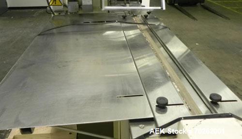 Used Ilapak Lynx Compak Model DUE Horizontal Wrapper capable of speeds up to 130 packages per minute. Has a two up sealing head and 2 speed 6' long lugged chain infeed on 9" centers with carrier chai...