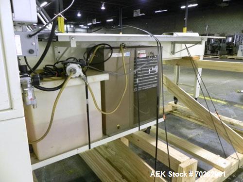 Used Ilapak Lynx Compak Model DUE Horizontal Wrapper capable of speeds up to 130 packages per minute. Has a two up sealing head and 2 speed 6' long lugged chain infeed on 9" centers with carrier chai...