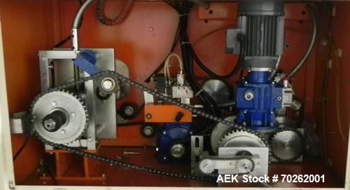 Used Ilapak Lynx Compak Model DUE Horizontal Wrapper capable of speeds up to 130 packages per minute. Has a two up sealing head and 2 speed 6' long lugged chain infeed on 9" centers with carrier chai...