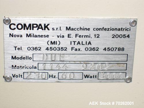 Used Ilapak Lynx Compak Model DUE Horizontal Wrapper capable of speeds up to 130 packages per minute. Has a two up sealing head and 2 speed 6' long lugged chain infeed on 9" centers with carrier chai...