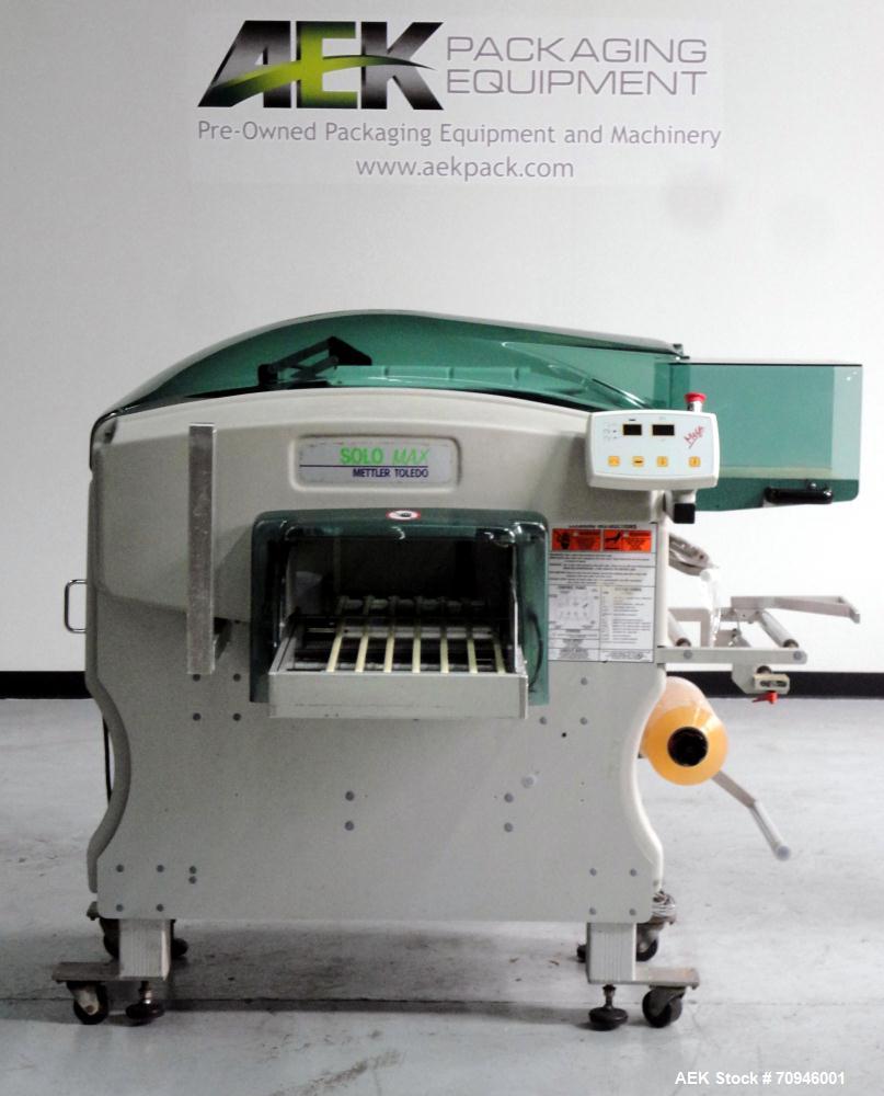 Used Exact Equipment Solo Max Automatic Stretch Wrapping Machine. Capable of speeds up to 30 ppm. Tray size from 7.1"L to 15.8"L, 5.1"W to 10.3"W, and 0.8" H to 5.5"H (Minimum to Maximum). Temperatur...