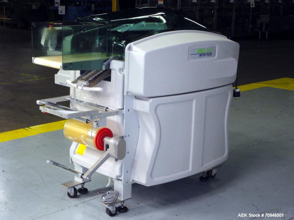 Used Exact Equipment Solo Max Automatic Stretch Wrapping Machine. Capable of speeds up to 30 ppm. Tray size from 7.1"L to 15.8"L, 5.1"W to 10.3"W, and 0.8" H to 5.5"H (Minimum to Maximum). Temperatur...