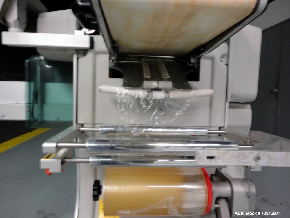 Used Exact Equipment Solo Max Automatic Stretch Wrapping Machine. Capable of speeds up to 30 ppm. Tray size from 7.1"L to 15.8"L, 5.1"W to 10.3"W, and 0.8" H to 5.5"H (Minimum to Maximum). Temperatur...