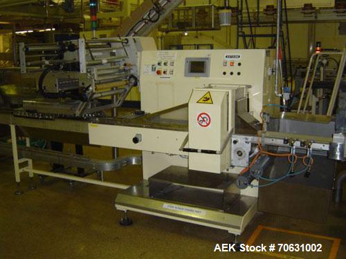 Used Otem M300DX Flowpack Wrapper.  Maximum pack height 3.5" (90 mm).  Maximum pack length 15" (380 mm).  Knives 9.4" (240 mm) long.  Maximum pack width 7.8" (200 mm).  Optional cardboard base feeder...