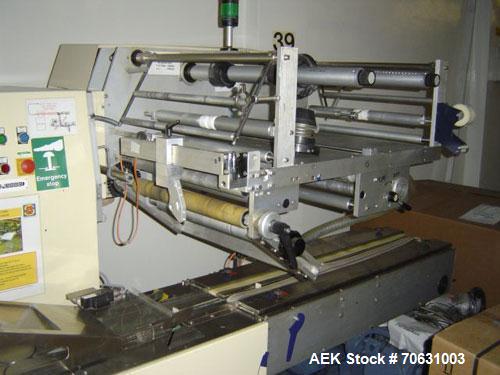 Used Otem M300DX Flowpack Wrapper. Maximum pack height 3.5" (90 mm). Maximum pack length 15" (380 mm). Knives 9.4" (240 mm) long. Maximum pack width 7.8" (200 mm). Optional cardboard base feeder. Com...