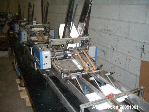 Used Pfankuch Model VP450 Series Wrapper System. Three station infeed section with mounts for three feeders. Three model 450 feeders, each equipped with 1-99 counters. One VP450 wrapper module with u...