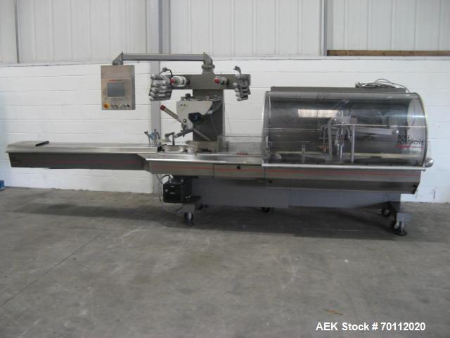 Used Rose Forgrove Flow Wrapping Machine, Model Integra 602. Stainless steel construction. Speeds up to 150 pieces per minute (depending on product size and film material). Long dwell crimping statio...