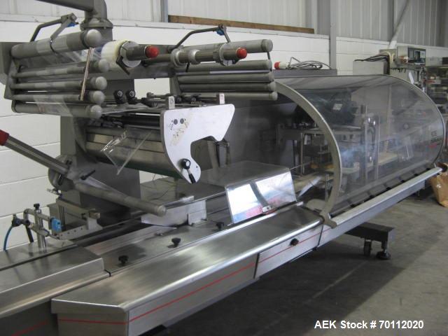 Used Rose Forgrove Flow Wrapping Machine, Model Integra 602. Stainless steel construction. Speeds up to 150 pieces per minute (depending on product size and film material). Long dwell crimping statio...