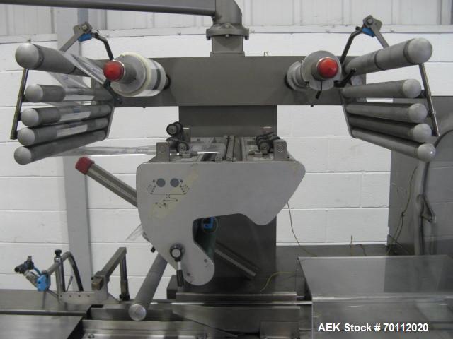 Used Rose Forgrove Flow Wrapping Machine, Model Integra 602. Stainless steel construction. Speeds up to 150 pieces per minute (depending on product size and film material). Long dwell crimping statio...